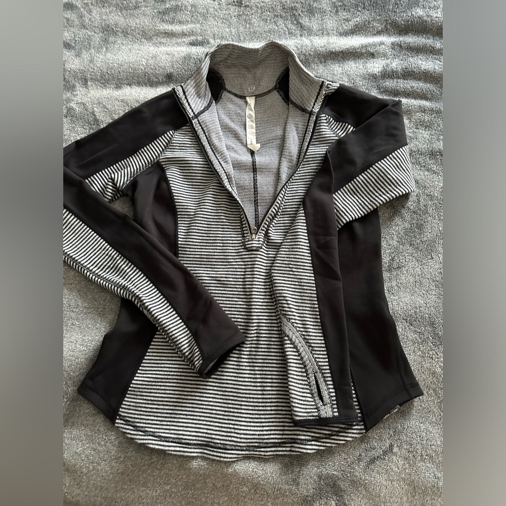 Lululemon pullover size 8 in good condition.